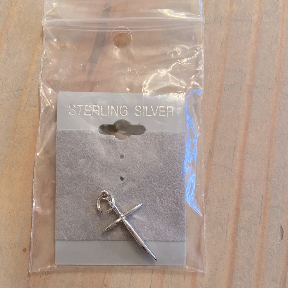 New in package sterling silver cross charm